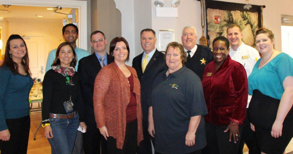 Left to Right: Christina Shiu (Business Office Manager), Carmen Navarro (Principal at Mariano Azuela Elementary School), Jigar Panchal (Genesis Rehab Services), Alderman Marty Quinn, Kimberly Hernandez (AGMV Activities Director), Chicago Police Superintendent Garry Mccarthy, Gay Wilson (AGMV Maintenance Director), Dave McNaughton (8th District Police Commander), Carol Shaw Burns (AGMV Executive Director), David Cyplik (AGMV Food and Beverage Director), Danielle Bischoff (AGMV Concierge)