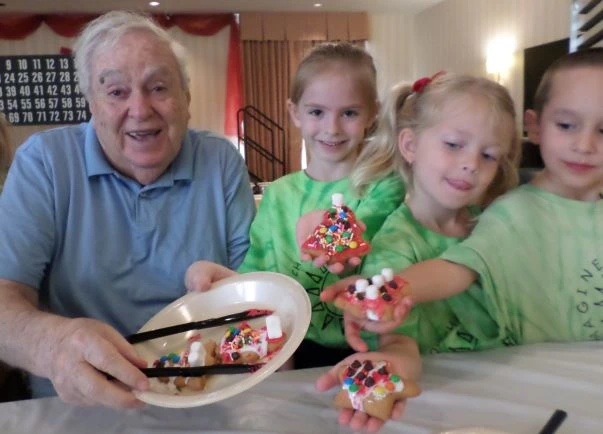 Senior celebrating Christmas with grandchildren