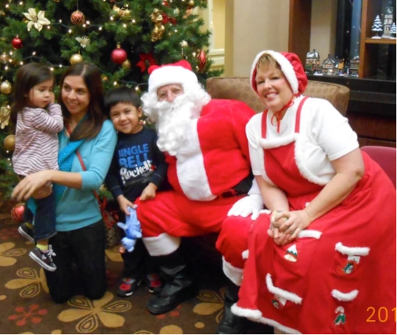 Annaliese, Leslie, Lucas, Pastor Tom Daly (Santa), and Cindy Wade