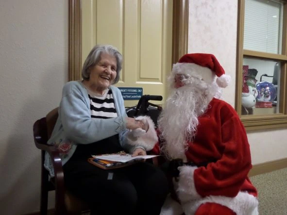 senior talking to santa