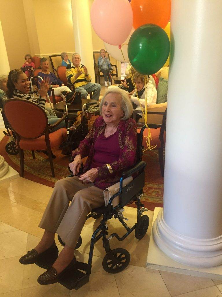 Bette shares a laugh with friends on her birthday.