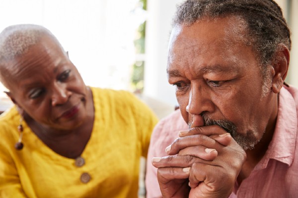 A woman tries to talk to her husband who is battling depression.