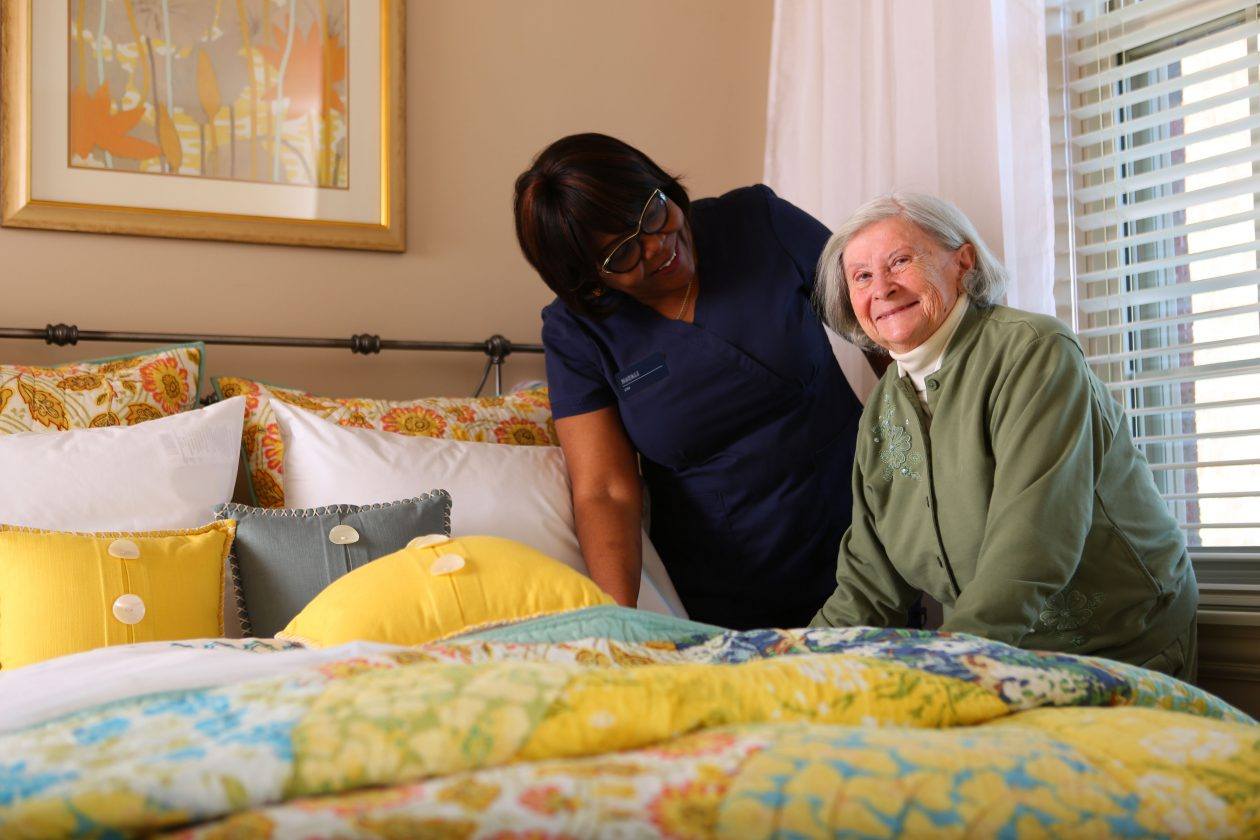 Housekeeper Helping a Senior