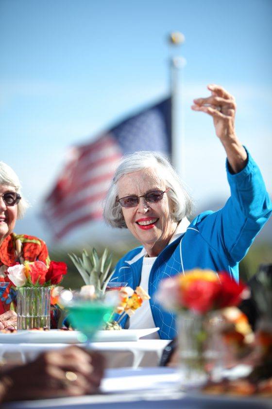 lady in front of american flag