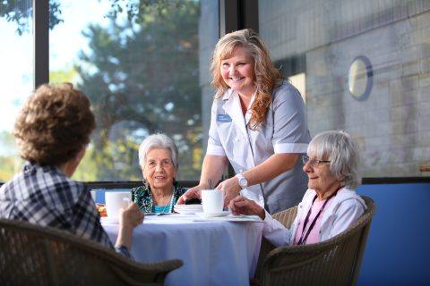 caretaker talking with women