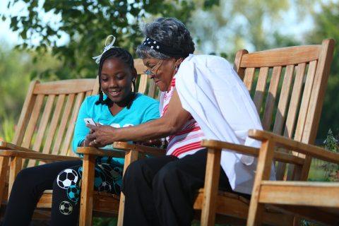woman sitting with granddaughter