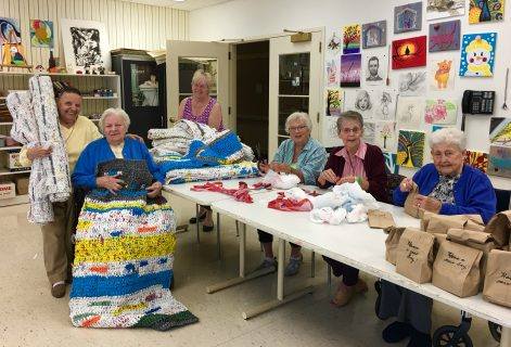 women making mats