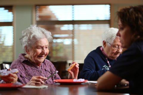 woman buttering toast