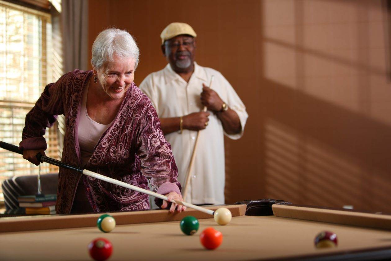 seniors playing pool