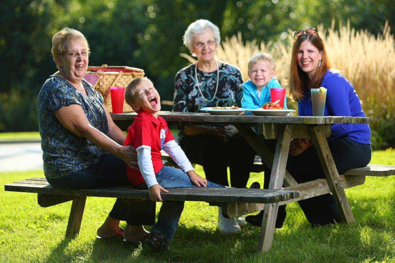 family at picnic bench