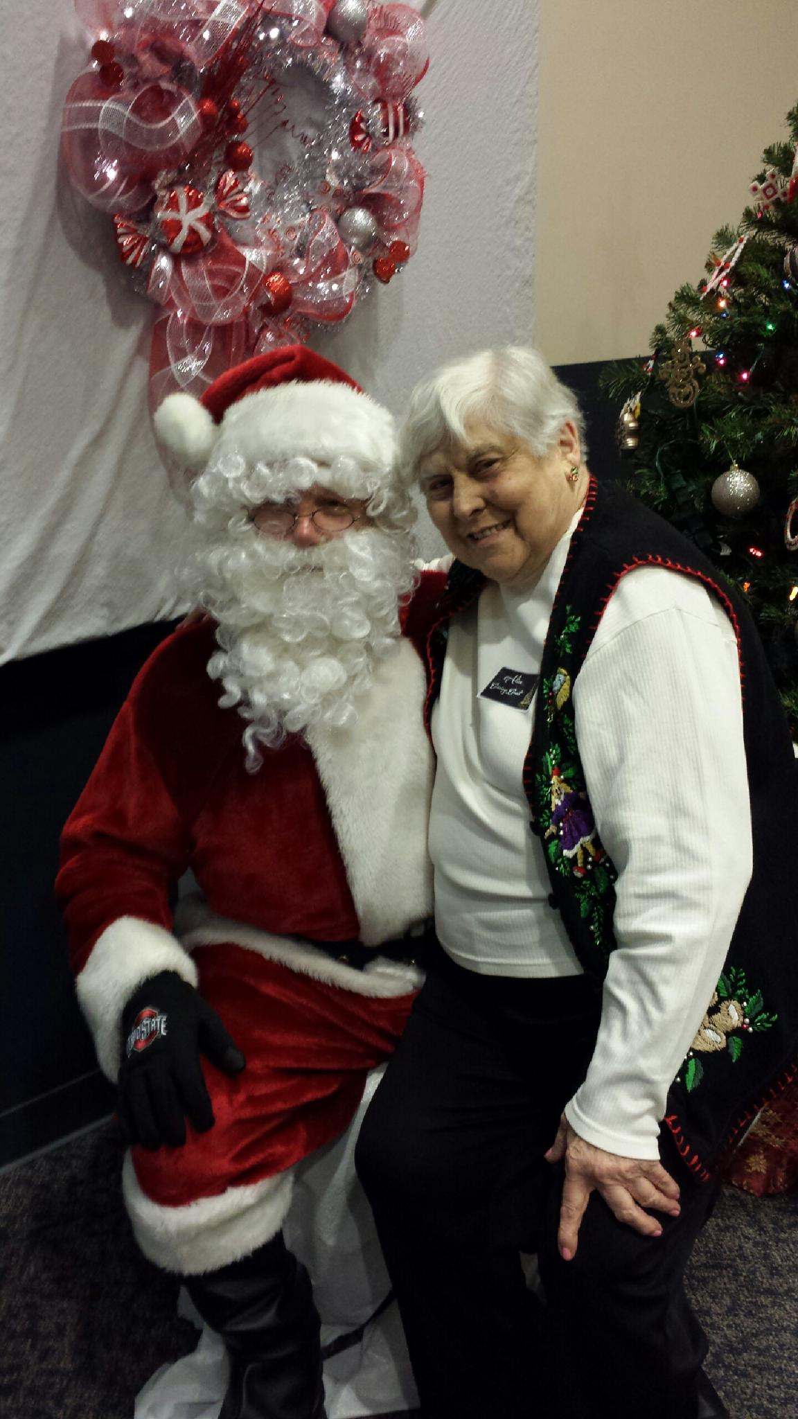 Alice Huffman enjoys a moment with Santa at the Windsor Senior Annual Christmas Potluck in Maryville