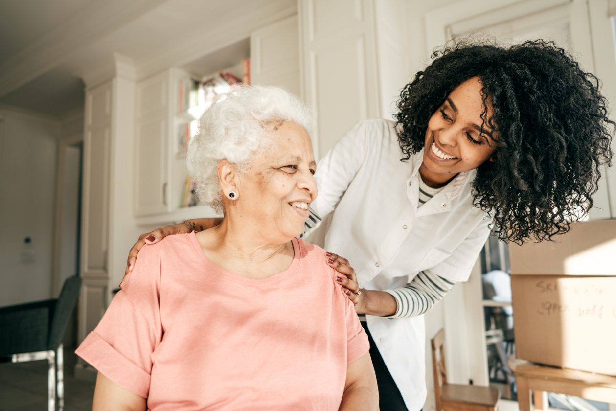 Senior receiving care from caregiver