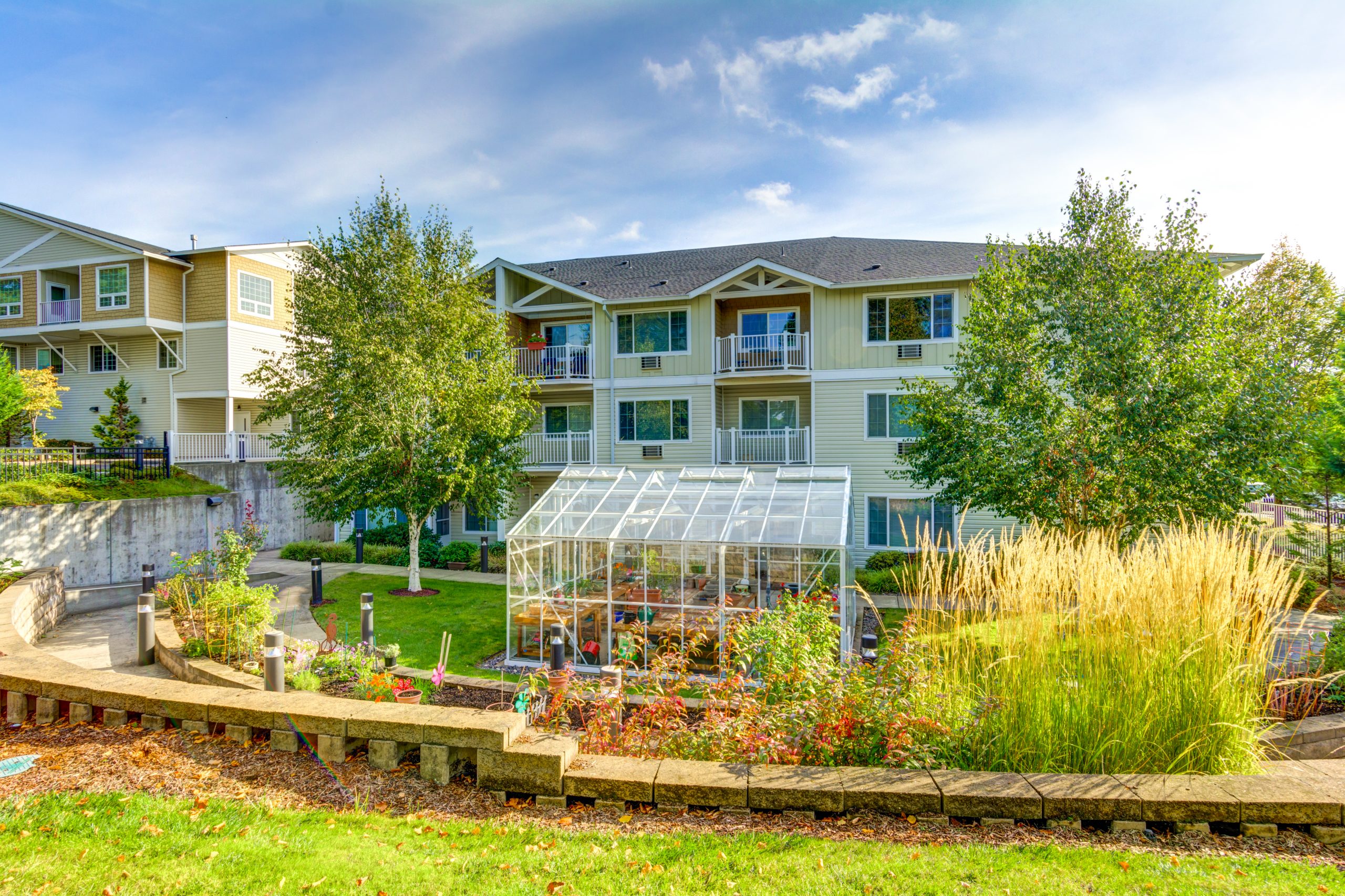 Courtyard fountains view of greenhouse and apartments