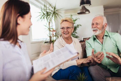 Two seniors getting help with their finances