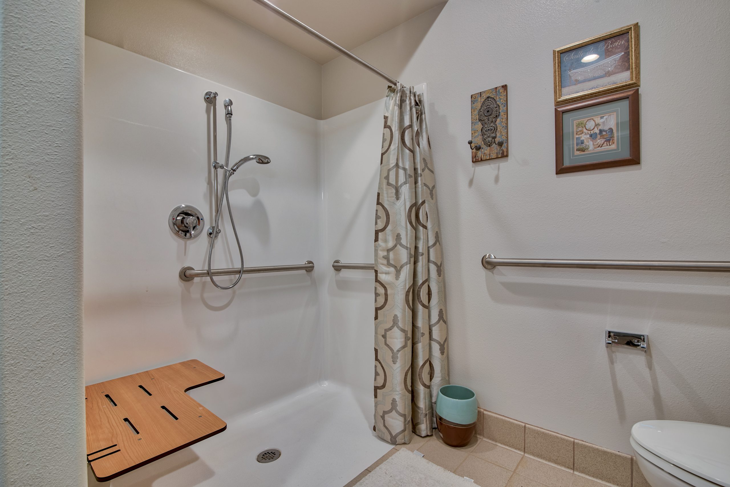 Pelican bay assisted living memory care community apartment walk in shower