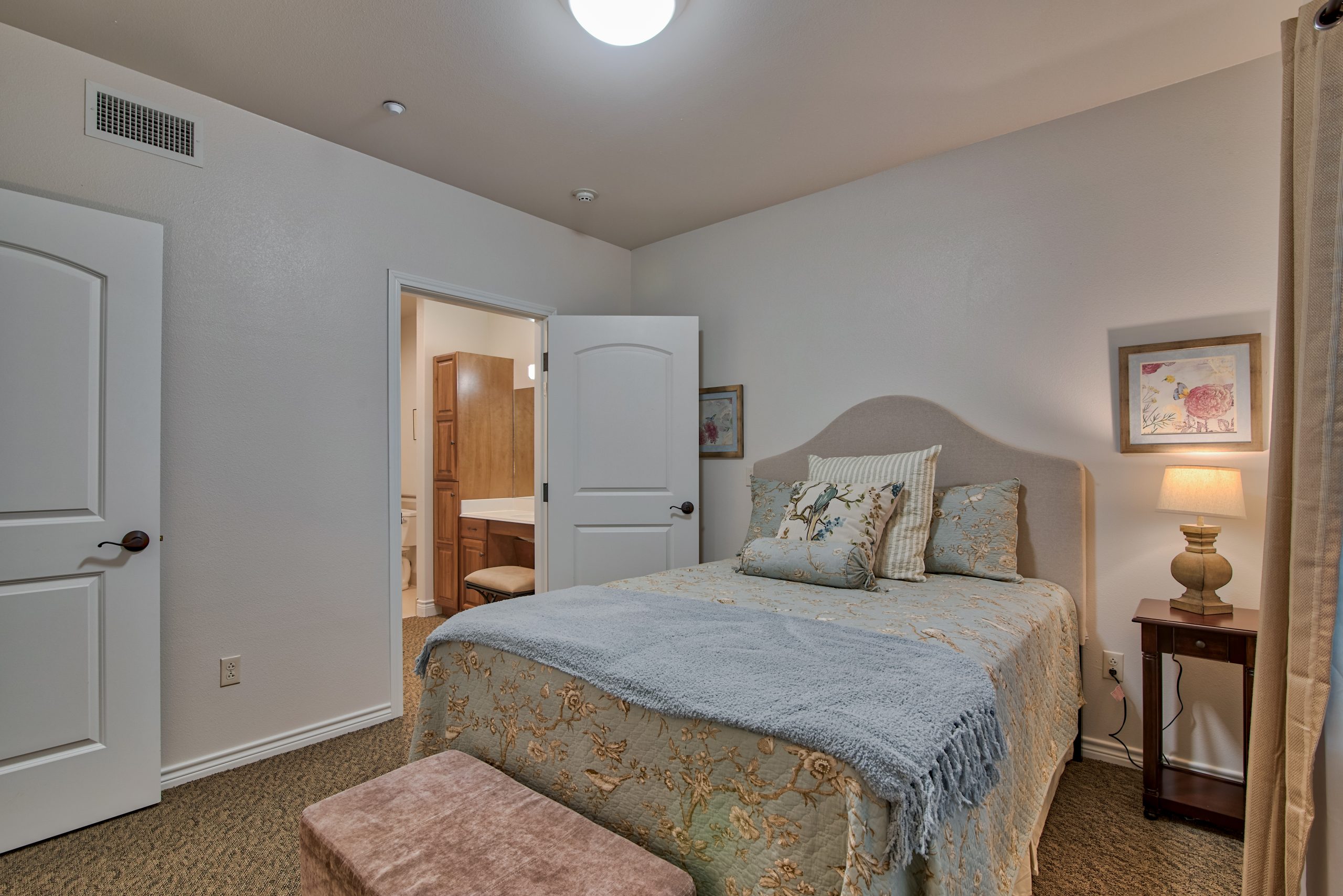 Pelican bay assisted living memory care community apartment bedroom
