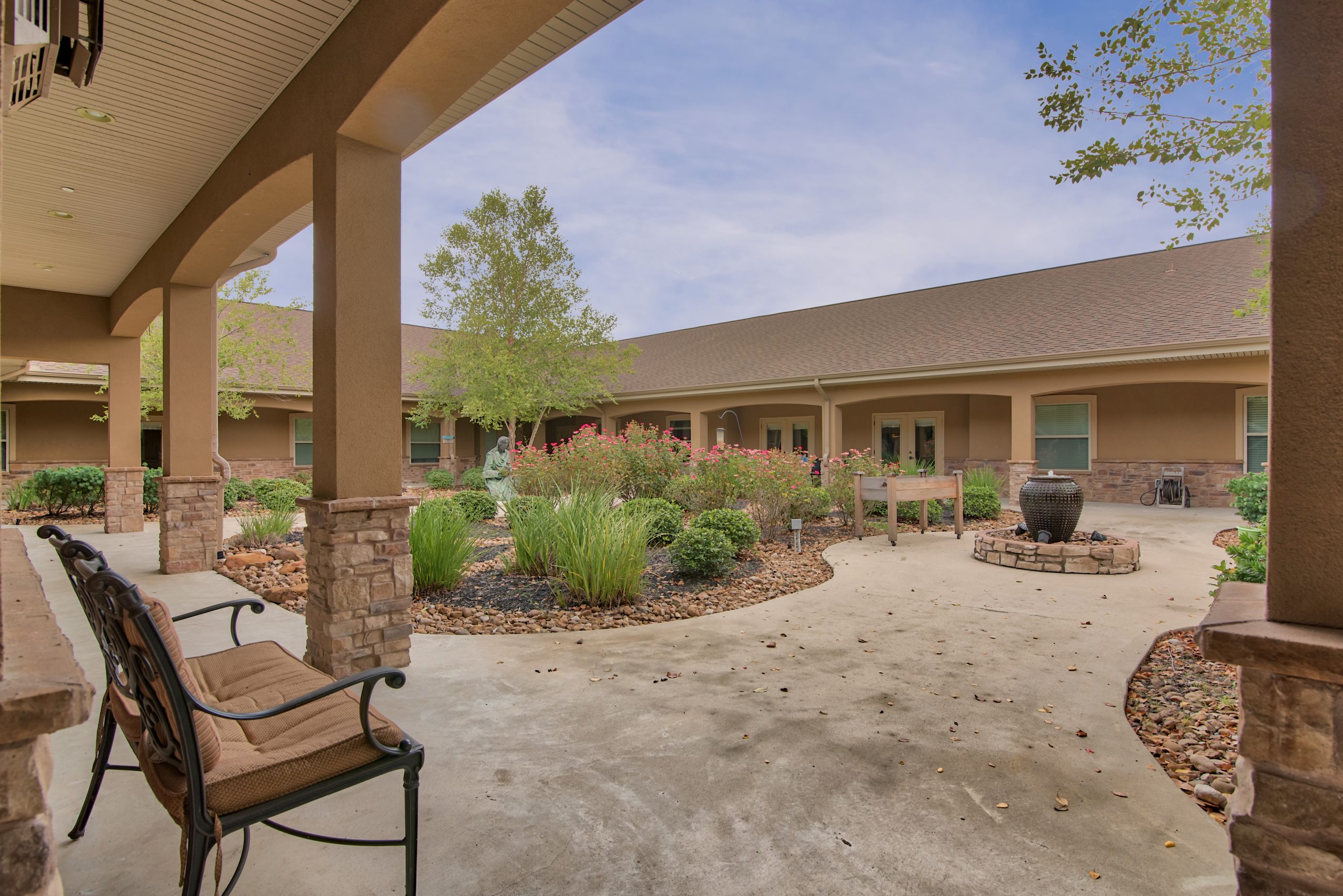 Pelican bay assisted living memory care community courtyard