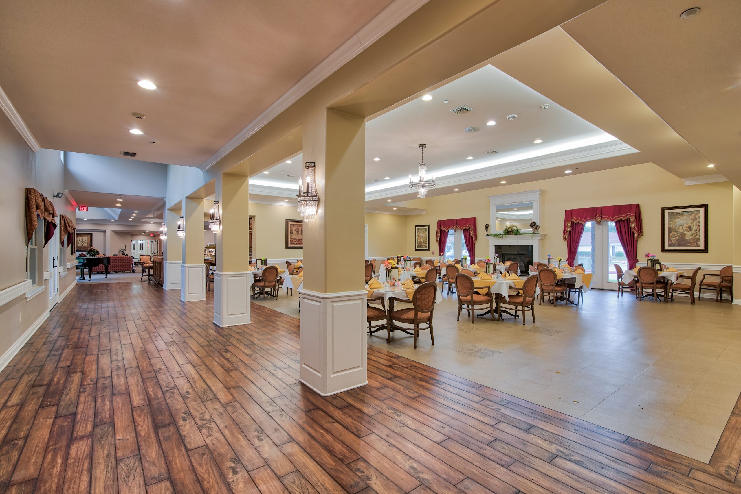 Pelican bay assisted living memory care community hallway and dining area