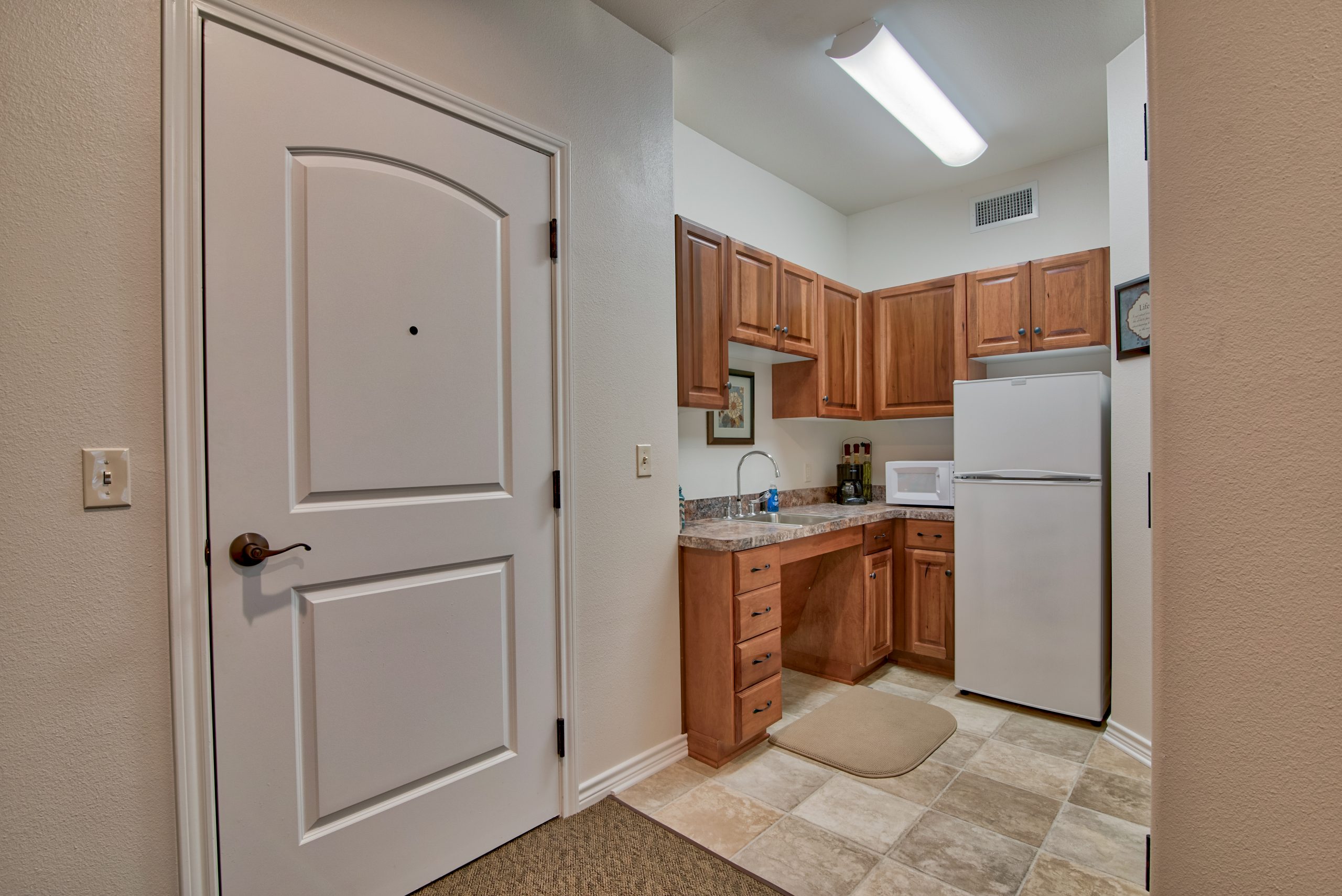 Pelican bay assisted living memory care community apartment kitchen