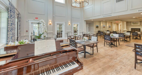 dining room with piano
