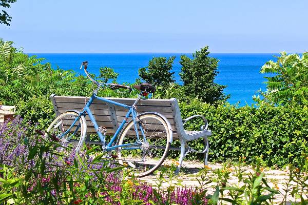 A park bench looks over Lake Michigan, near North Chicago, a stone’s throw from Lake Bluff.