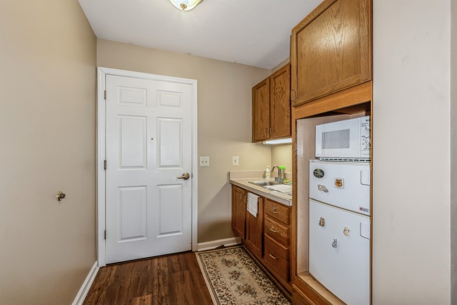 The Addison of Somers Place Entryway into kitchenette