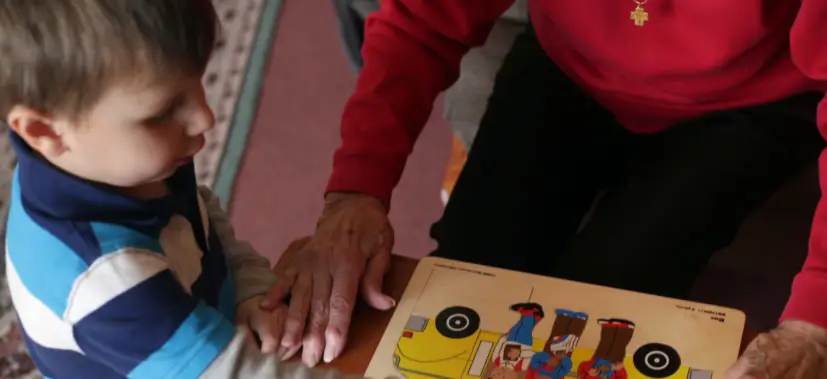 Grandson and Grandma spending quality time at preschool