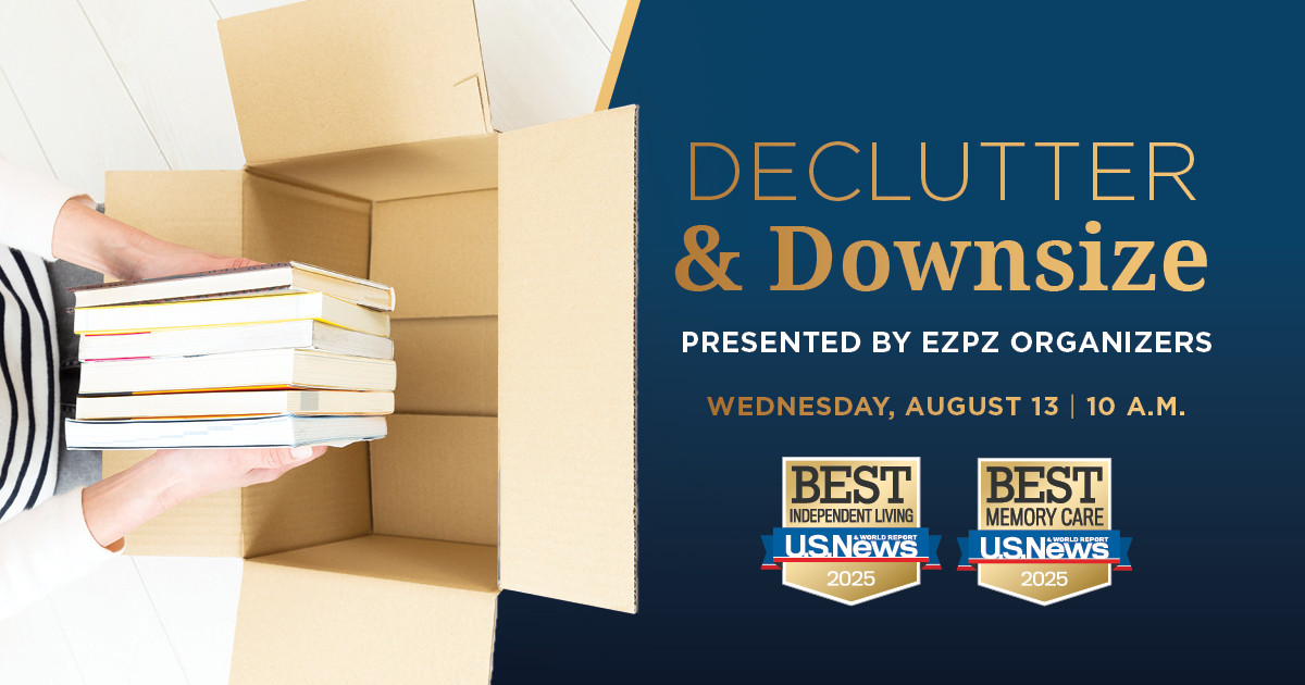 Packing books away into a box.