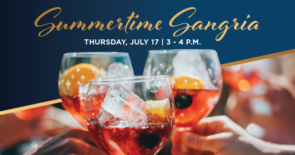 People toasting glasses of sangria.