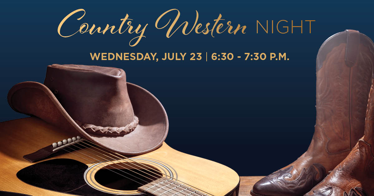 A guitar with a cowboy hat on top next to cowboy boots.