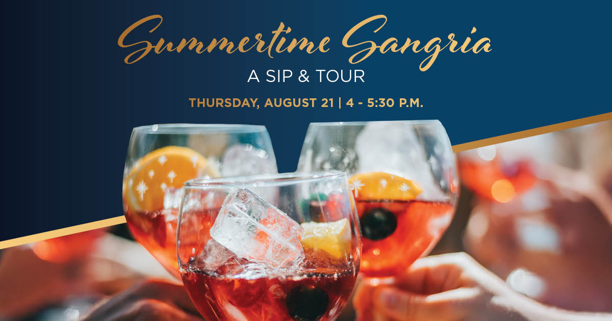 People toasting glasses of sangria.