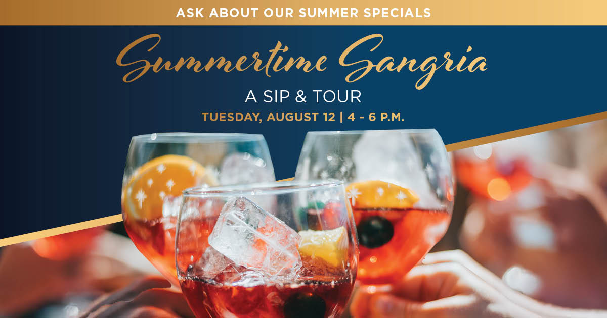 People toasting sangria with one another.