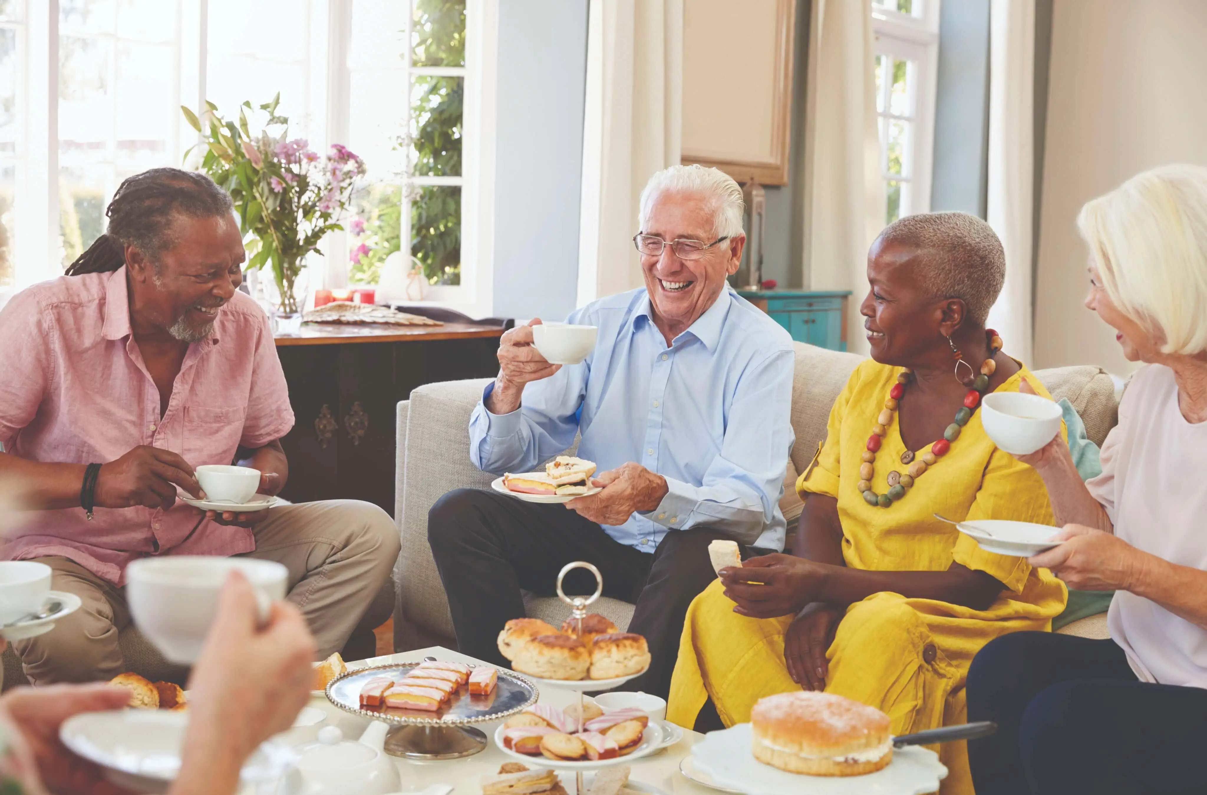 senior friends having tea