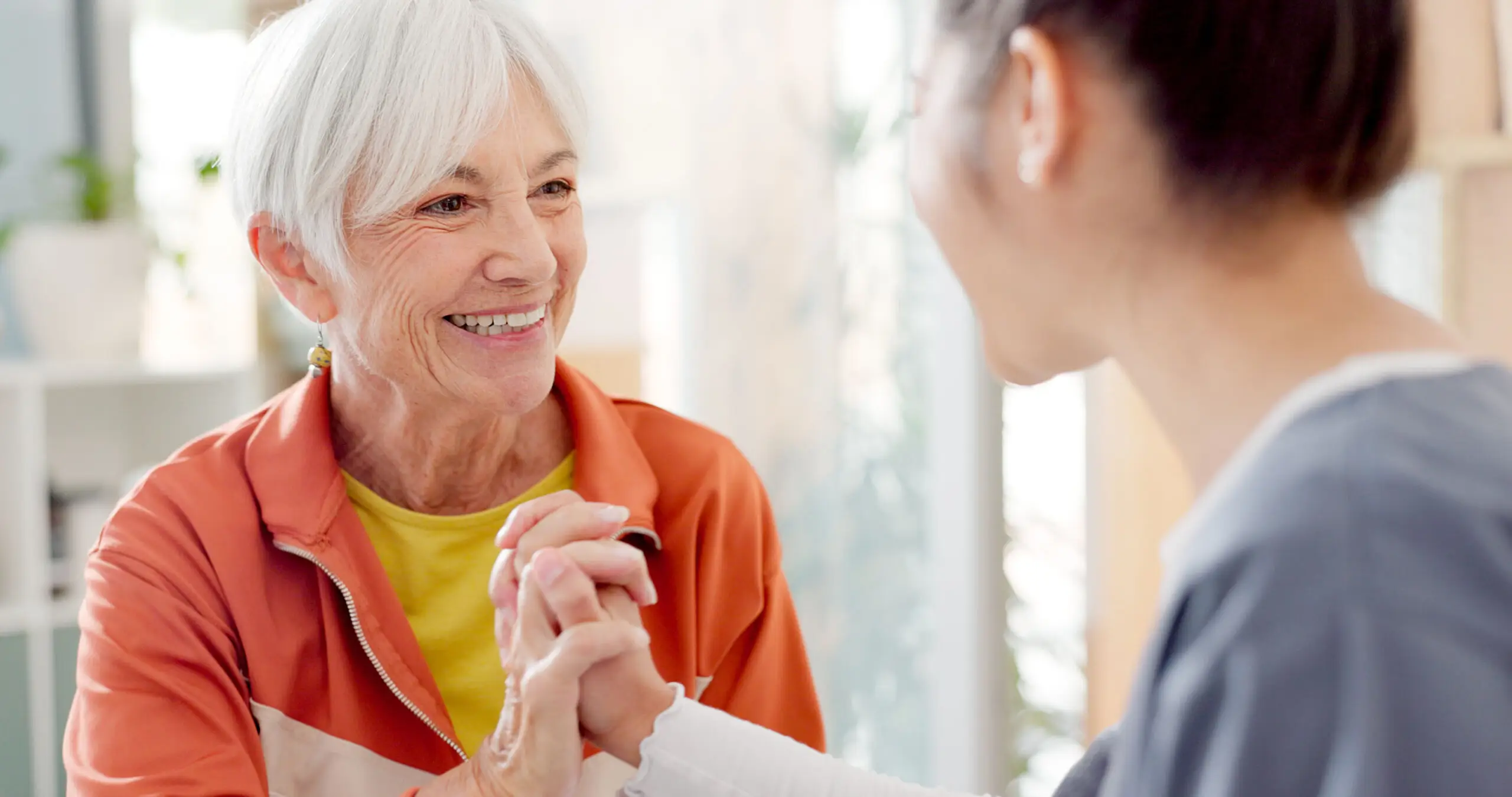 Skilled_nursing_resident_happy_with_nurse-scaled