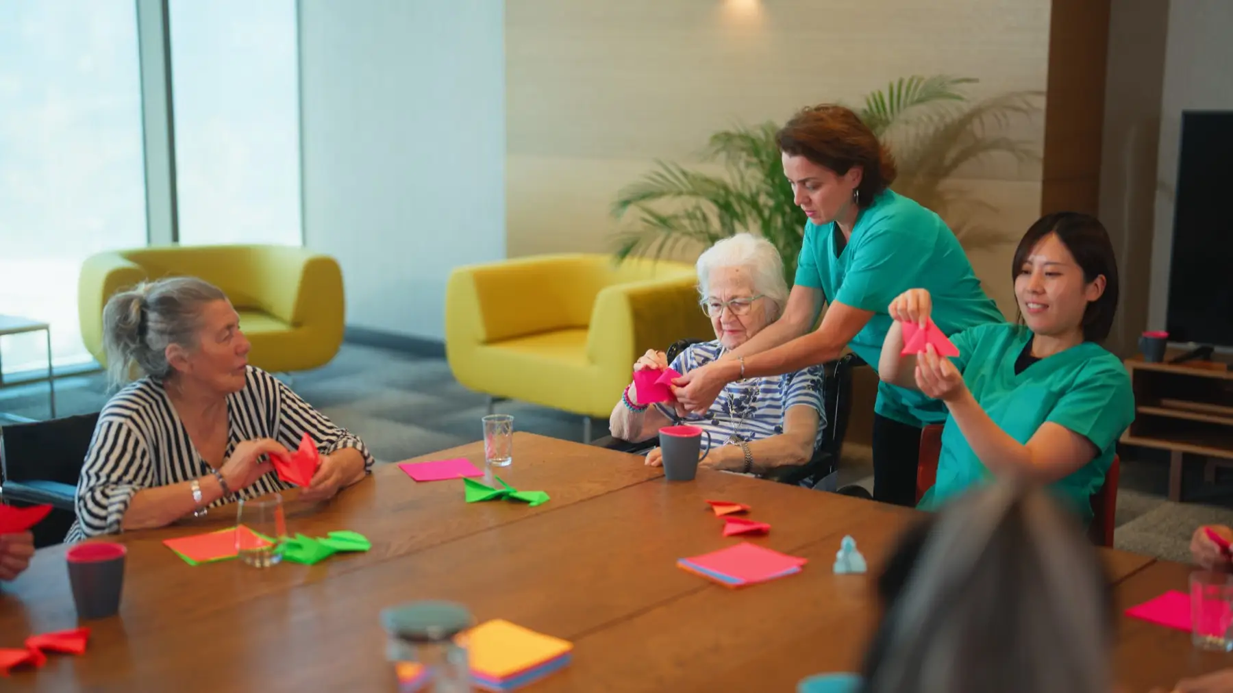 Group of senior people enjoying learning and doing craft in nursing home. Group of senior people enjoying learning and doing craft in nursing home.