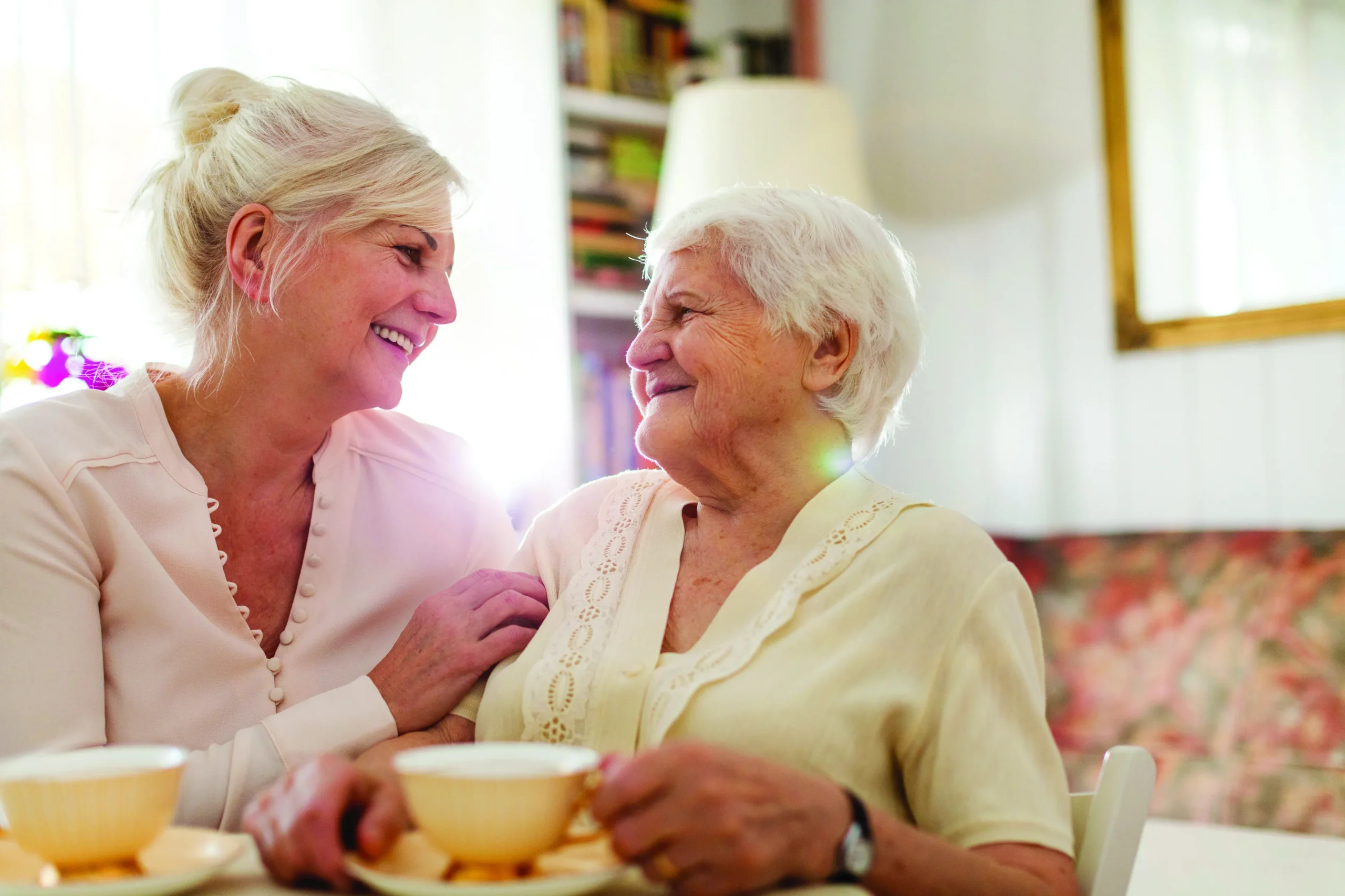 memory-care-mother-and-daughter-smiling-scaled Memory Care. mother and daughter smiling together.